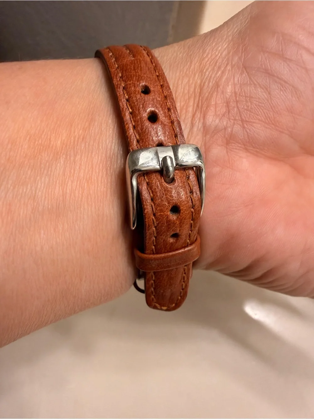 Brown Leather-Strap Watch with Gold-Bezel Accent need battery